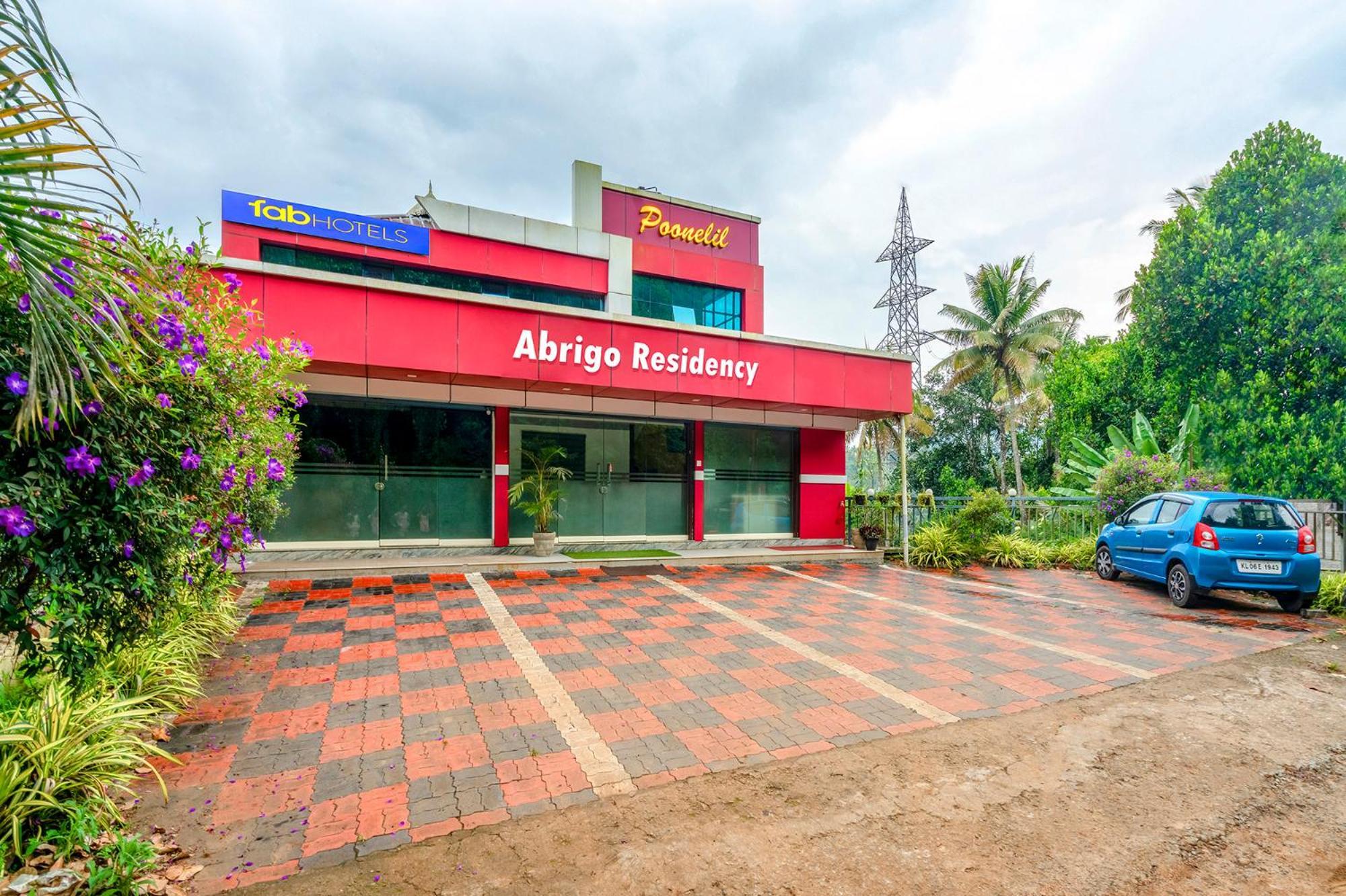 Fabhotel Abrigo Residency Anaviratty Exterior photo